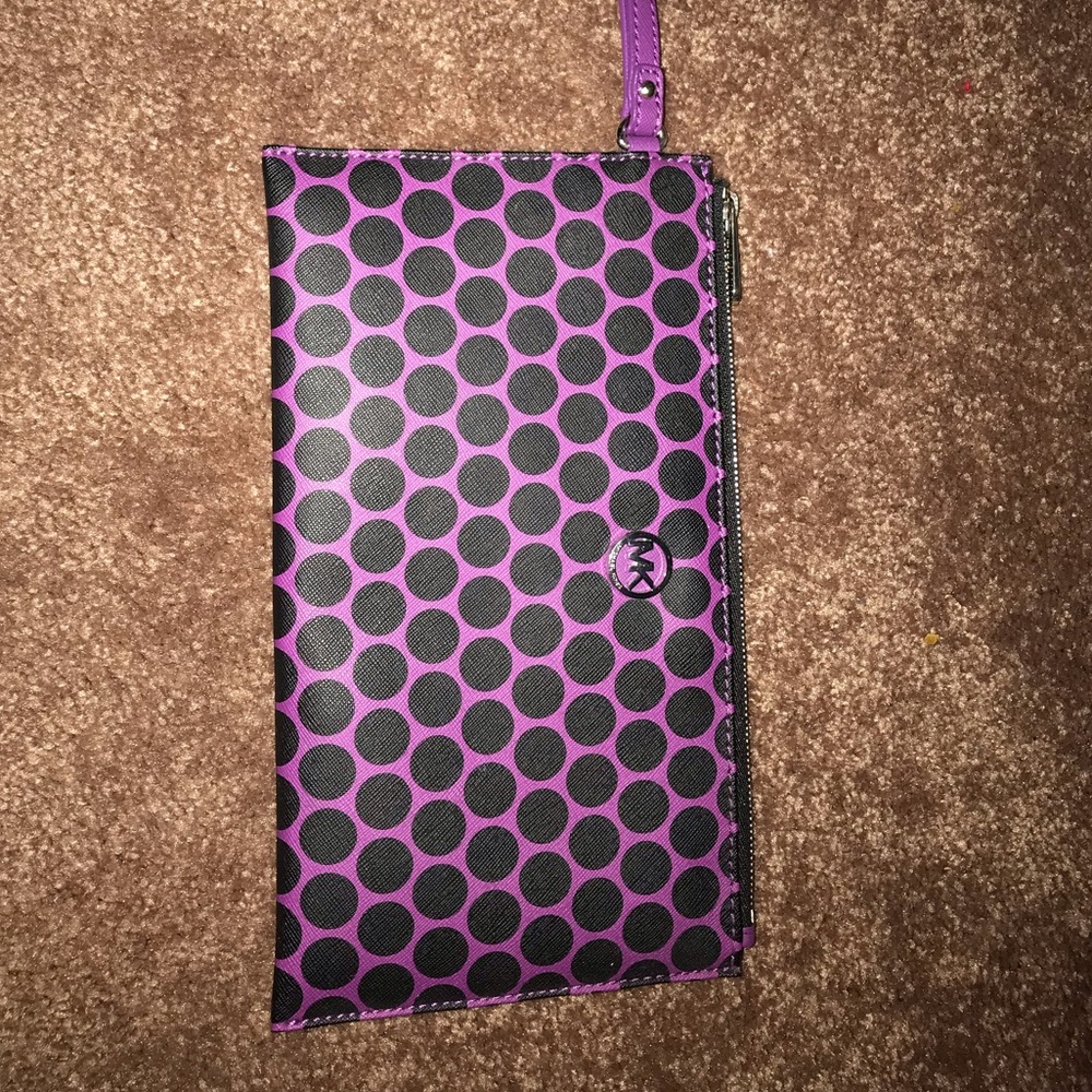 Purple and Black polkadotted Michael Kors wristlet